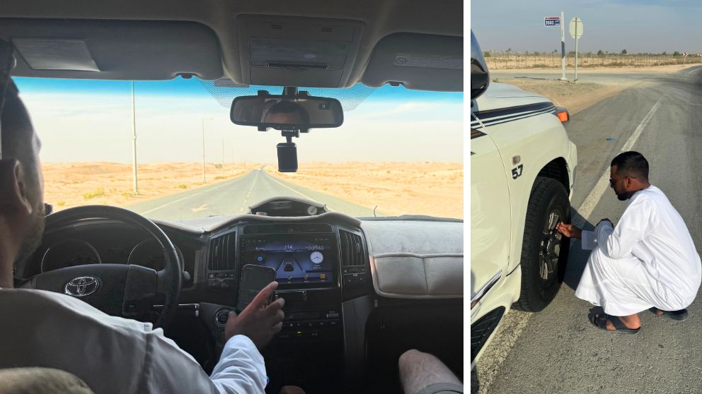 アブダビの砂漠ツアーへ向かう時の車窓。運転手さんが車のタイヤの空気を抜いている様子