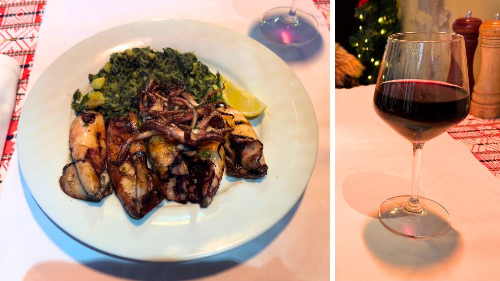 レストランでオーダーした赤ワインとイカのグリル。付け合わせはジャガイモとほうれん草の炒め物