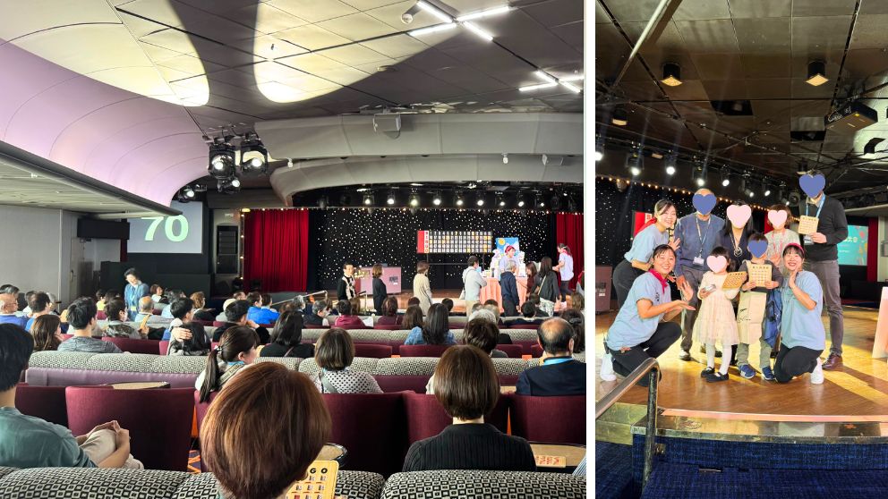 飛鳥Ⅱのギャラクシーラウンジで開催されたビンゴ大会。ステージ上の大きなスクリーンにビンゴの数字が表示され、多くの乗客がカードを手に盛り上がっている様子