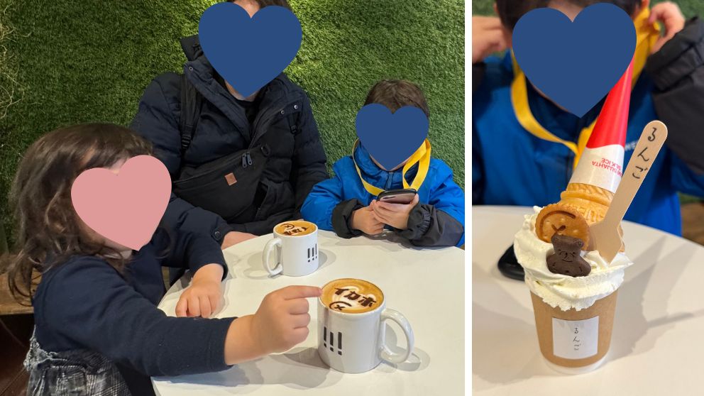 伊香保石段街のカフェ・るんごで「イカホ」のラテアートを指さす娘。ソフトクリームも豪華