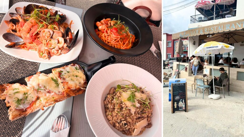 Blue Cave Bar & Restaurantの魚介のパスタやリゾット、チーズをのせたパンと店舗の外観。建物の2階にはパラソルを備えたオープンテラスがある。